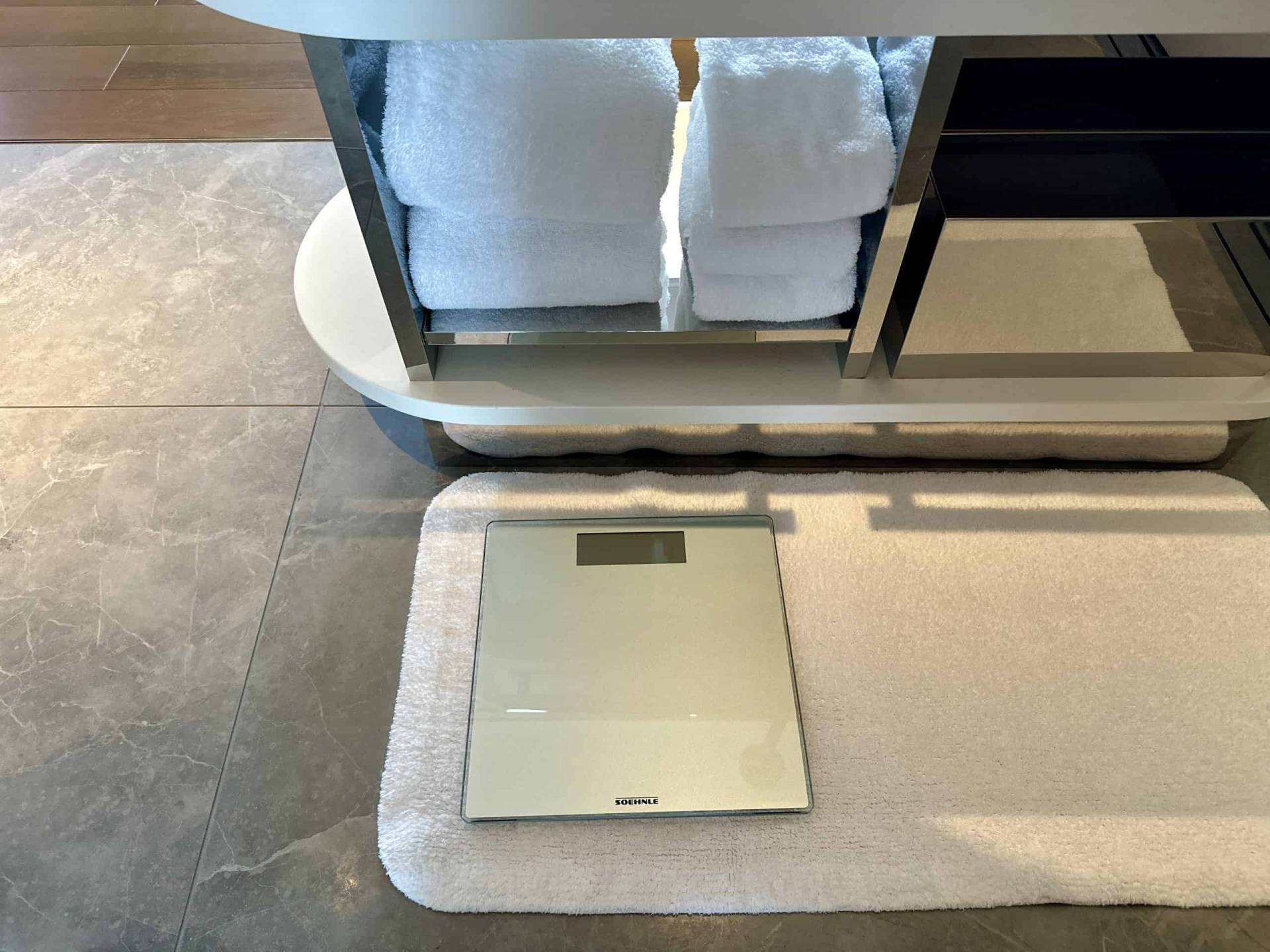 Weight scale is tucked neatly under the sink