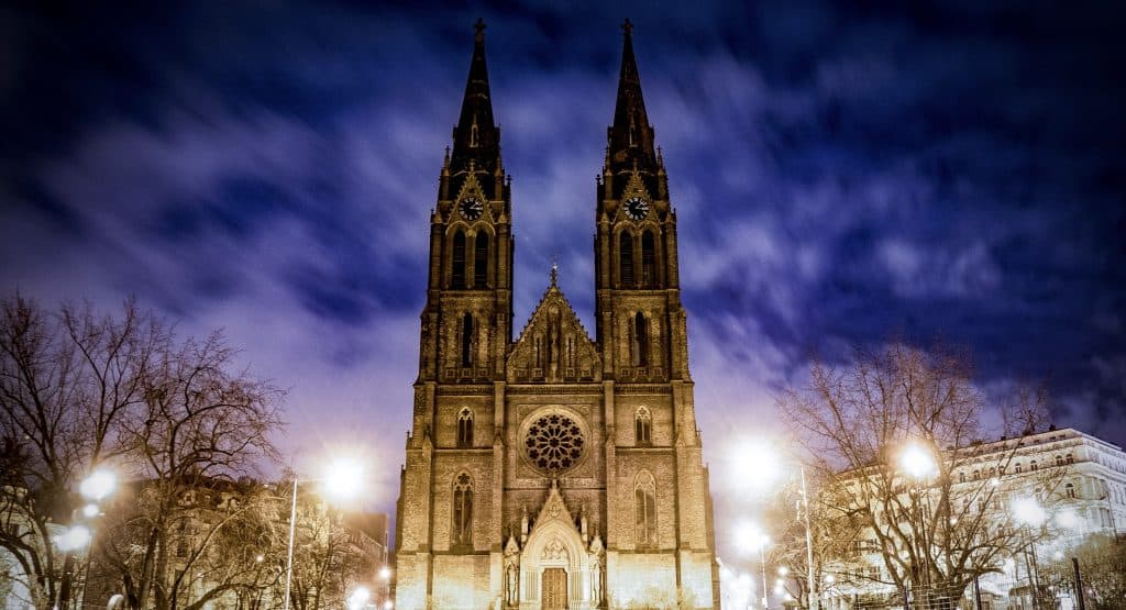 Illuminated Basilica of St. Ludmila at night, Prague.