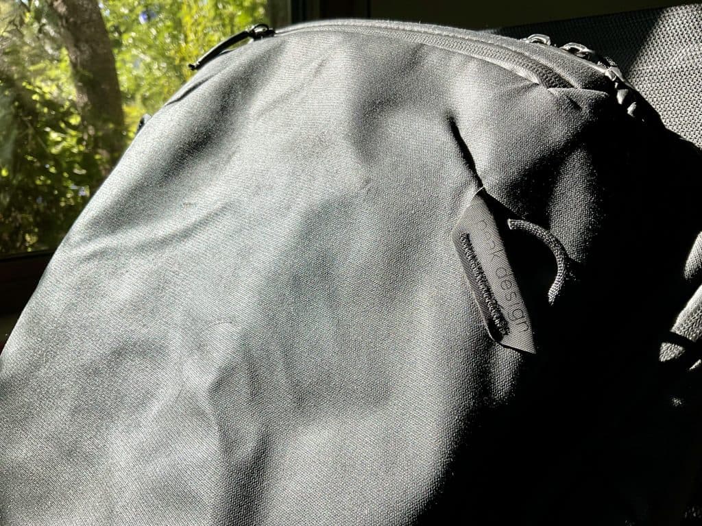 Peak Design 45L Travel Backpack with weatherproof recycled nylon canvas and high-visibility grey nylon interior.